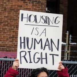 Housing is a human right sign