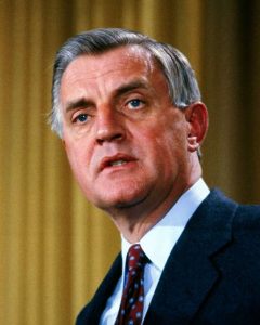 Photo of Walter S Mondale, a white man with gray hair wearing a suit and tie